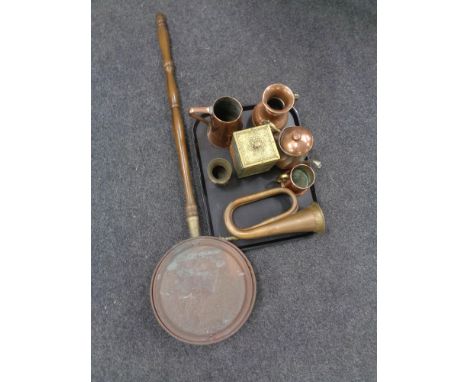 A copper bed warming pan together with tray of metal wares including copper bugle, Art Nouveau copper drinking vessel, kettle