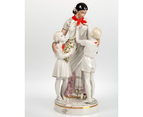 A SOVIET PORCELAIN FIGURAL GROUP OF INDIRA GANDHI WITH TWO PIONEERS AFTER BRONISLAV BISTRUSHKIN (RUSSIAN 1926-1977), KRASNY F