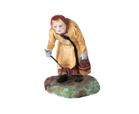 A RUSSIAN PORCELAIN FIGURE OF AN OLD, HUNCHED-OVER PEASANT WOMAN, GARDNER PORCELAIN FACTORY, MOSCOW, LATE 19TH CENTURY realis