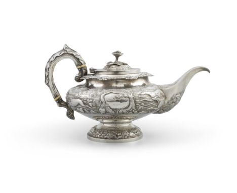 AN IRISH SILVER TEAPOTCork, c.1834, mark of W.S Palmer of squashed melon shape, the cover with floral finial, the body profus