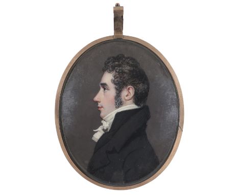 λEnglish School c.1800 Portrait miniature of a gentleman in profile, wearing a black coat Oval, in a gilt metal frame, the gl
