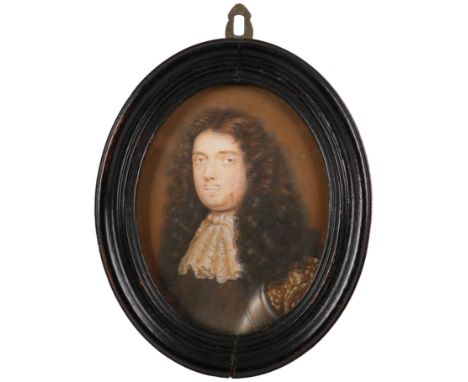 Manner of Samuel Cooper Portrait miniature of a gentleman wearing armour, a lace cravat and long wig On paper, oval, in an eb