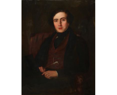 Follower of Francis Grant Portrait of a gentleman, wearing a black coat and brown waistcoat, seated in an interior holding a 