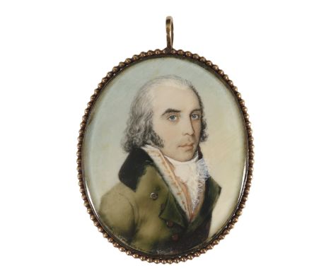 λFrench School c.1790 Portrait miniature of a gentleman wearing a green coat Oval, in a gilt metal frame with beaded border, 