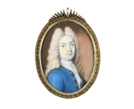 λEnglish School c.1700 Portrait miniature of a gentleman wearing a blue coat and long powdered wig Oval, in a gilt metal fram