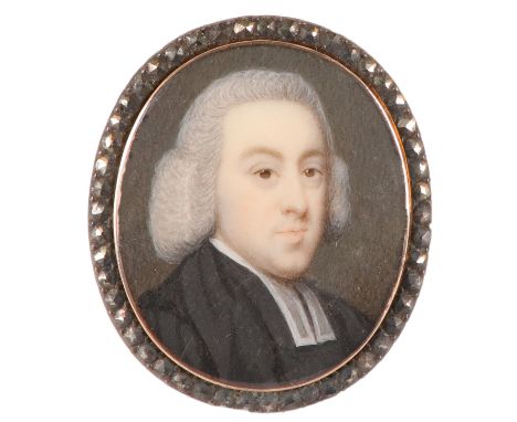 λEnglish School Mid 18th Century Portrait miniature of a clergyman wearing a powdered wig Oval, in gilt metal frame with past