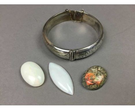 SILVER BANGLE,with engraved scrolling foliate decoration, along with a loose fire opal and two other opals