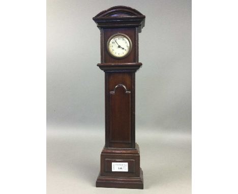 MINIATURE MAHOGANY LONGCASE CLOCK,43cm high, along with a mahogany mantel clock and Metronome (3)