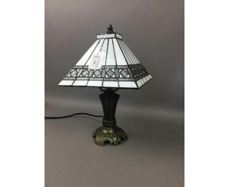 TIFFANY STYLE DESKTOP LAMP,with stained and leaded shade, on bronze effect base, 30.5 cm high