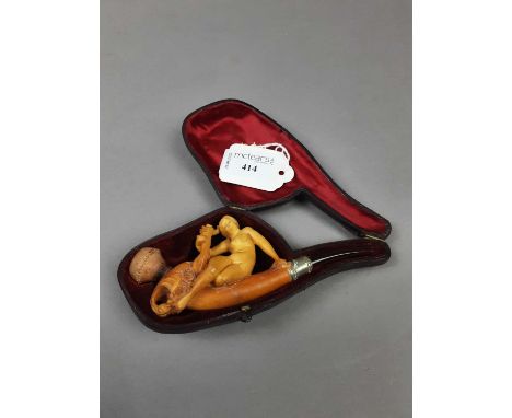 CASED MEERSCHAUM PIPE,figurally modelled with a reclining female holding a lute, 13cm longCondition is good, end of pipe come