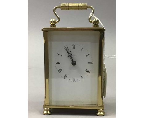 DOMINIUM BRASS CARRIAGE CLOCK,12cm high, along with a German Canterbury quartz brass clock (2)