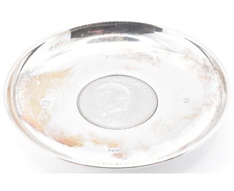 A 1960s Roberts &amp; Dore Ltd silver hallmarked pin dish / trinket dish of round form. The dish being set with a 1965 Church