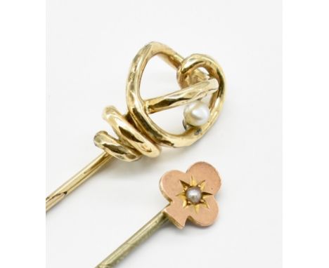 To gold and pearl stick pins to include a shamrock finial pin set with a seed pearl on a white metal pin and a gold knot desi