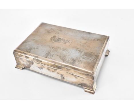 A hallmarked silver fitted jewellery trinket box. The box on bracket feet having engine turned&nbsp; decoration to top&nbsp; 