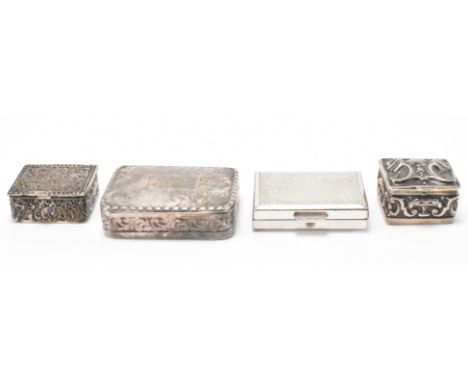 An assortment of four silver caskets. The collection to include a box with acanthus leaves and beaded edges to the top, a box