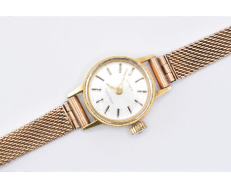 A vintage Tissot Seastar Seven ladies wrist watch held upon a 9ct gold woven link strap. Case marked Waterproof, No 160/200.&