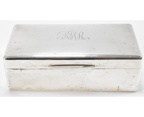 A hallmarked silver 1920s Art Deco era cigarette box. The box of rectangular form with engraved initials 'RMR' to the lid. Fu