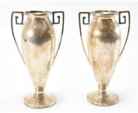 A pair of hallmarked silver Kender &amp; Stokes Art Deco era 1920s twin handled posy vases. The vases of tapered form with an