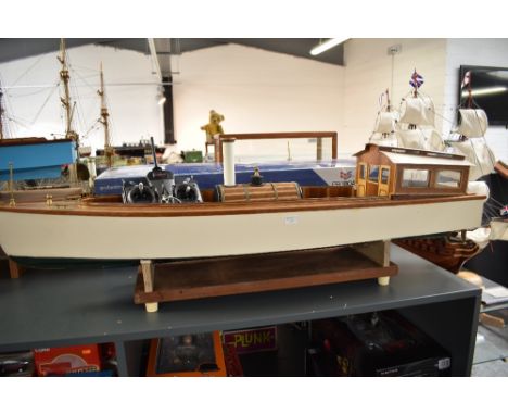 A wooden hand built radio controlled model Steam Cruiser Boat, with controller, length approx 115cm