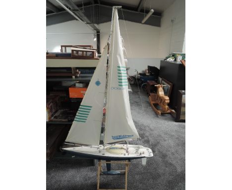 A semi scale North Wind 36-600 radio controlled model Sail Boat/ Racing Yacht, length 90cm, height 159cm, on wooden cradle st