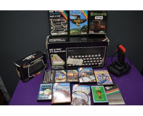 A Sinclair ZX Spectrum Personal Computer 48K Ram in original box, Spectrum Joystick Interface in original box, Spectravideo J