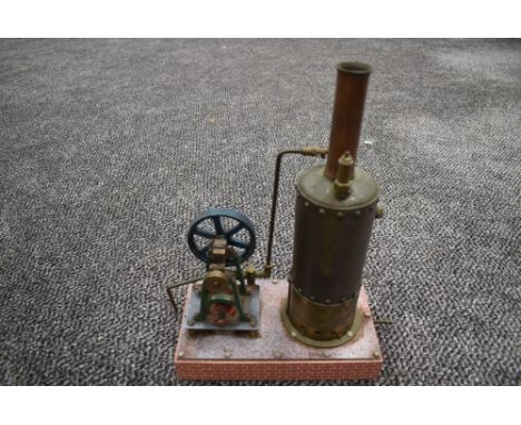A well engineered Single Cylinder vertical live steam model Mill Engine having spoked flywheel, brass and copper boiler, on w