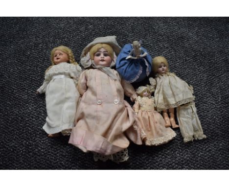 Four early 20th century and later dolls, Armand Marseille Alma numbered 9/0, length 30cm, three smaller having composition or