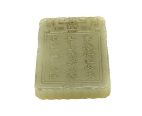 A Chinese jade plaque,20th century, of rectangular form, carved with a literatus pointing at a crane above, with a boy next t