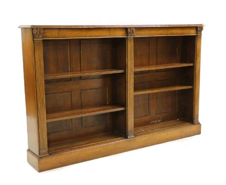 A walnut open bookcase,20th century, with two divisions and fluted pilasters, with four adjustable shelves,175cm wide 25.5cm 