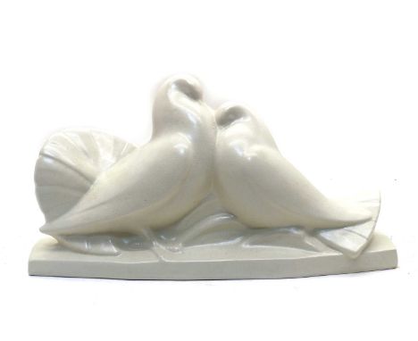 A continental glazed ceramic centrepiece,circa 1930s, modelled as a pair of doves,36cm wide17cm highCondition ReportThe glaze