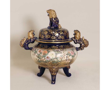 A Japanese Satsuma ware koro and cover,Meiji period (1868-1912), by Kinkozan, the compressed globular form supported by three