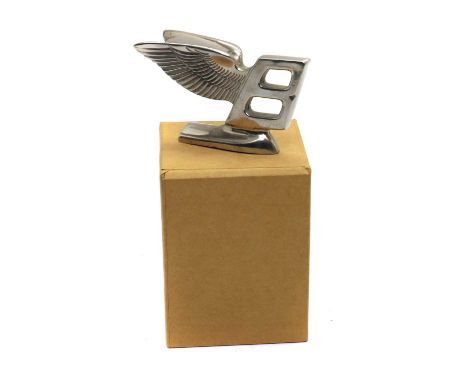 A Bentley Type R Flying-B car mascot,c.1960, polished chromium,5cm high9.25cm longProvenance: From the collection of John Ren
