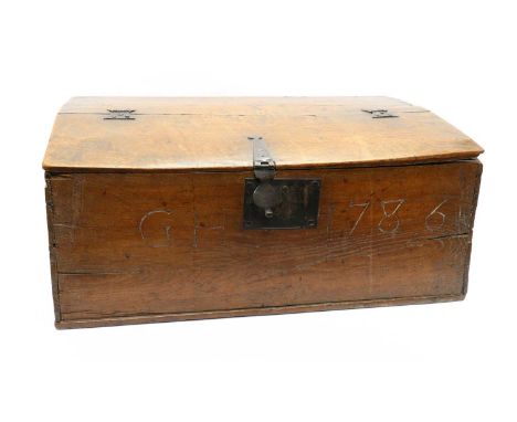 An 18th century oak bible box,the front engraved 'GH 1786', the interior with a two-compartment shelf, 60.5cm wide38.5cm deep