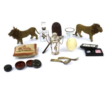 A group of items of lion interest;comprising a modern cut glass decanter, c.1960, with a white metal mount, 25.5cm high, a cl