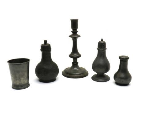A collection of pewter items,18th century and later, to include pepper pots, egg cups, a candlestick, cups, a lidded pot, a 1