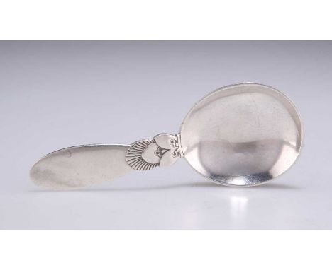 GEORG JENSEN: A DANISH STERLING SILVER CACTUS PATTERN CADDY SPOON by Georg Jensen, 1933-1944 mark, Sterling Denmark. 9.7cm lo