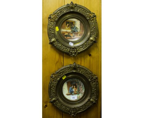 PAIR OF BRASS PLAQUES WITH HAND PAINTED CERAMIC INSET