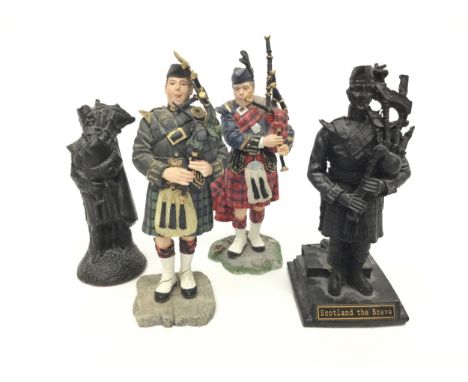 LOT OF FOUR FIGURES OF PIPERS, including two ceramic examples, each modelled in kilt piping, the tallest 16cm high