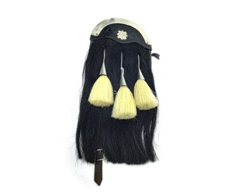 THREE-TASSELED SPORRAN BY LECKIE, GRAHAM &amp; CO. OF GLASGOW, leather and hair, white metal top and badge with bugle motif o
