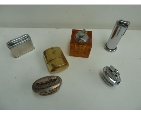 A selection of table lighters, including Parker Roller Beacon and an Art Deco glass lighter