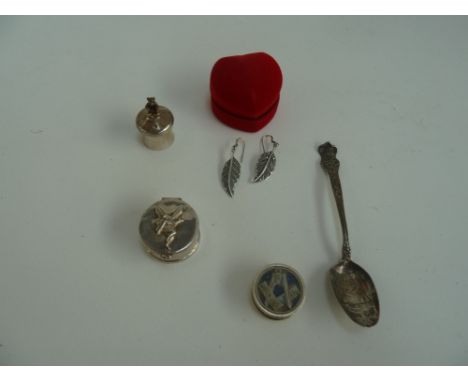 A silver pill box by R. Carr with a fairy engraved to lid, another silver pill box with teddy to lid, a silver spoon, a pair 