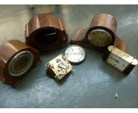 A clock mechanism, two walnut mantle clock casings, a mahogany mantle clock casing, with an Art Deco clock