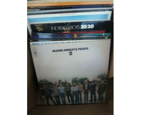 A mixed box of vinyl LPs to include Elvis Costelloe; Blood Sweat and Tears; Jean Michel Jarre, Jethro Tull, Eric Clapton, Gen
