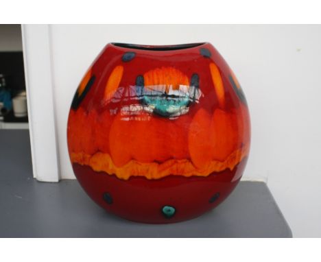 A hand painted 'Volcano' purse Poole Pottery vase, red, orange, green and blue glaze, marks impressed on base with original l