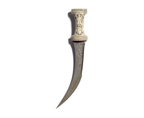 A Qajar walrus ivory-hilted jambiyya  Persia, 19th Centurythe double-edged watered-steel blade of curved form, the spine part