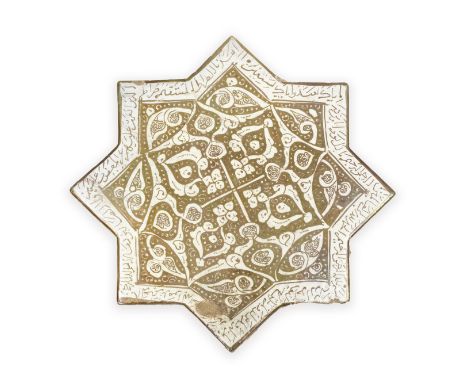 A large Kashan lustre pottery star tile from the Imamzadeh Yahya at Veramin Persia, circa 1262in the form of an eight-pointed