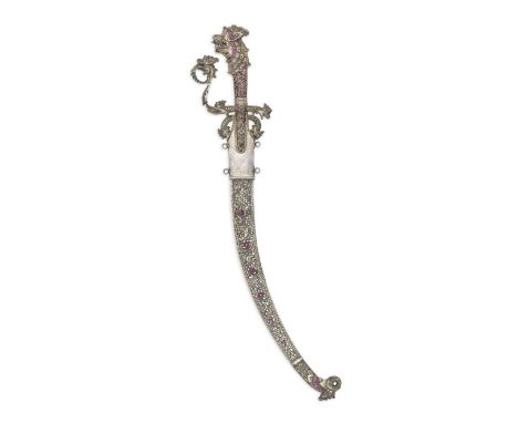 A Singhalese ruby-set gilt-silver Kastane Ceylon,  circa 1900the single-edged blade of curved form with octagonal grip, knuck