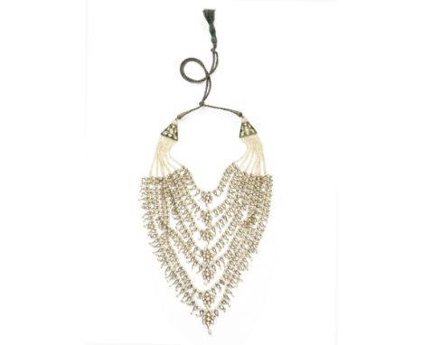 A diamond-set enamelled gold and pearl necklace (satlara) North India, 20th Centurycomprising seven seed pearl and bead stran