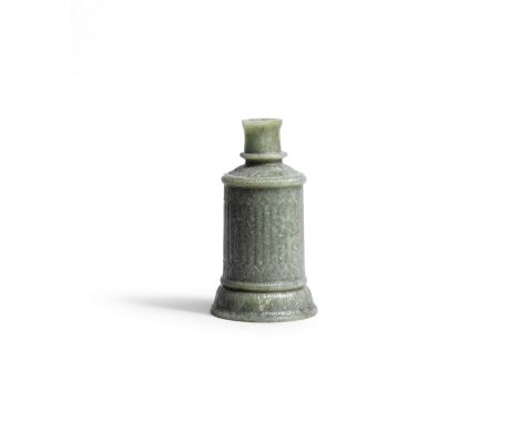 An unusual Mughal jade Candlestick Northern India,  18th Centuryof mid greyish-green mottled jade, made in three sections, th