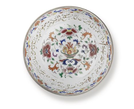 A silver-mounted porcelain bowl for the Islamic market China, 18th Centuryof deep rounded form on a stepped silver foot, deco